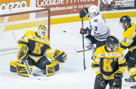  ?? JULIE JOCSAK/STANDARD STAFF ?? Goalie Mario Peccia of the Kingston Frontenacs defends the net against Ben Jones of the Niagara IceDogs in OHL action at the Meridian Centre in downtown St. Catharines on Thursday.