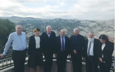  ?? (Jeremy Sharon) ?? BAYIT YEHUDI MKS pose yesterday in Ma’aleh Adumim with Mayor Benny Kashriel (third from right).