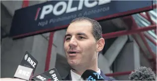  ?? PHOTO: NZ HERALD ?? MP JamiLee Ross talks to media outside the Wellington Central Police Station on Wednesday after his interview with police.