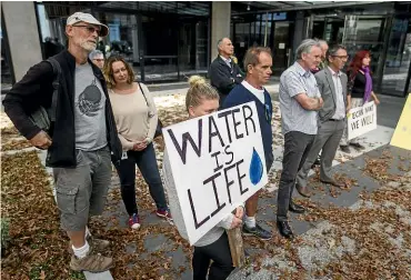  ?? ALDEN WILLIAMS/STUFF ?? Aotearoa Water Action handed a petition against water bottling to Environmen­t Canterbury in April.