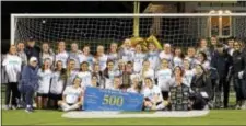  ?? COURTESY OF TCNJ ATHLETICS ?? The TCNJ women’s soccer team celebrates winning the NJAC title, which also served as the 500th career win for coach Joe Russo.