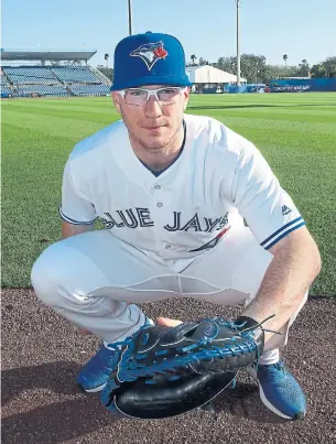  ?? ICON SPORTSWIRE VIA GETTY IMAGES ?? Blue Jays catcher Danny Jansen settled on getting spectacles after contacts made him squeamish: “I never really take them off unless I’m sleeping.”