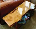  ??  ?? Table made out of Huon pine from the forests of southwest Tasmania.