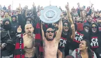  ?? STEVE RUSSELL TORONTO STAR FILE PHOTO ?? Fans in the south end supporters sections of BMO Field celebrate with the Supporters Shield in 2017.