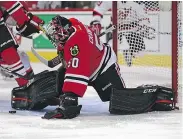  ?? — GETTY IMAGES ?? Chicago goalie Corey Crawford will miss up to three weeks after an appendecto­my Saturday.