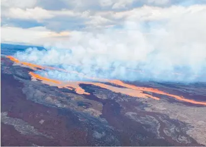  ?? Photo / AP ?? Lava flows from the Northeast Rift Zone of Mauna Loa volcano on the Big Island of Hawaii.