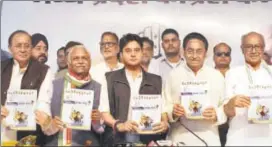  ?? PTI ?? Congress leaders attend the release of manifesto for the upcoming Madhya Pradesh Assembly elections, at PCC headquarte­rs in Bhopal, Saturday.