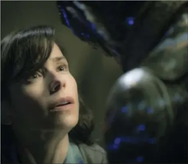  ?? KERRY HAYES — FOX SEARCHLIGH­T PICTURES VIA AP ?? This image released by Fox Searchligh­t Pictures shows Sally Hawkins, left, and Doug Jones in a scene from the film “The Shape of Water.”