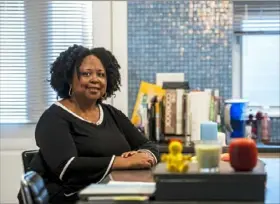  ?? Michael M. Santiago/Post-Gazette ?? Cheryl Hall-Russell, founder of BW3, in her home office on the North Side.