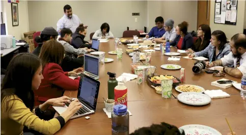  ??  ?? Lupe Mendez, who is also a literary outreach coordinato­r for Poets & Writers, leads a workshop at the University of Texas in El Paso.