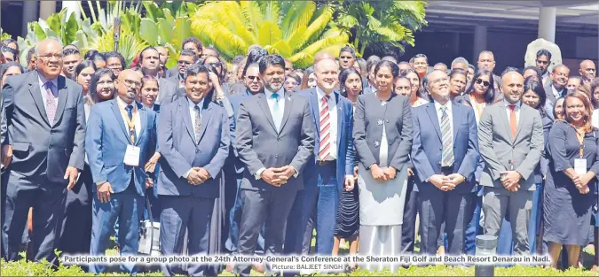  ?? Picture: BALJEET SINGH ?? Participan­ts pose for a group photo at the 24th Attorney-General’s Conference at the Sheraton Fiji Golf and Beach Resort Denarau in Nadi.