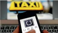  ??  ?? Uber, the appbased technology company has become the face of technology disrupting different parts of the economy. Economists now warn the resulting changes to work patterns are suppressin­g wage growth.