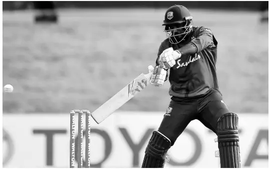  ?? CWI MEDIA ?? Sunil Ambris plays a cut shot during the One Day Internatio­nal against Ireland. Ambris top scored with 148 runs to lead West Indies to a five wicket win at Malahide Ground in Dublin, Ireland.