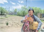  ??  ?? Buying from Amazon spares Rigzin Dolker, an expectant mother who lives outside Leh, from having to trek into town to shop.