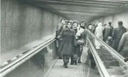  ?? COLIN MCCONNELL/TORONTO STAR FILE PHOTO ?? In 1978, when this photo was taken, there was a moving sidewalk for passengers in the Spadina subway station tunnel. Sadly, it was removed a decade ago.