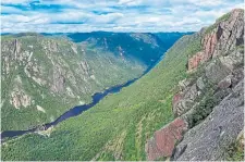  ?? VLADONE GETTY IMAGES ?? A view from the Acropole-des-Draveurs trail in Quebec’s Charlevoix region. The area is packed with great hiking and delicious food.