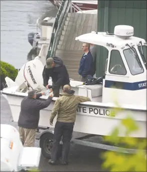  ?? H John Voorhees III / Hearst Connecticu­t Media ?? The search for a missing teen who was last seen swimming Monday afternoon in Candlewood Lake off Dike Point Recreation Area resumed on Tuesday.