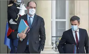  ??  ?? Le Premier ministre, Jean Castex (à g.), et le ministre de la Santé, Olivier Véran.