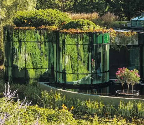  ??  ?? Columns, green roofs and beautiful ponds grace the Teron home. The personally designed, 5,600-square-foot abode is now up for sale.