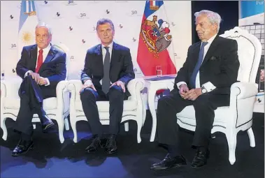  ?? FOTOS: MARCELO SILVESTRO ?? DISCURSO. “Estuvimos cerca de caer en el rumbo de Venezuela”, dijo Macri junto a Piñera y Vargas Llosa.