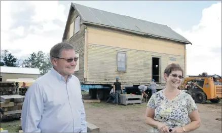  ?? Photos: Rick MACWILLIAM/EDMONTON JOURNAL ?? Ed and Marie Stelmach came to Ukrainian Cultural Heritage Village to see the Stelmach ancestral home which was moved to the village from their property on Wednesday. It was the second or third home Stelmach’s grandparen­ts built after moving to the area...