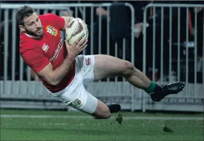  ?? Picture: AP ?? THE LION WING: Tommy Seymour finishes off a length-of-the-field movement in Wellington yesterday.