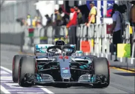  ?? REUTERS ?? Lewis Hamilton topped the timings, while his Mercedes teammate Valtteri Bottas was third.
