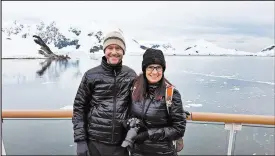  ?? GARTH LEWIS ?? Garth Lewis and Joy Jaeger, of Miller, pose for a photo in Antarctica from their cruise ship Greg Mortimer in mid-March.