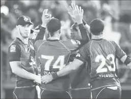  ??  ?? Trinbago Knight Riders celebrate another wicket en route to their 67-run victory over Guyana Amazon Warriors on Wednesday night.