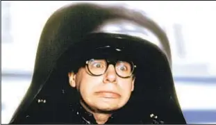  ??  ?? FBI photo (below) of Capitol riot suspect is a ringer for Rick Moranis (above, in “Spaceballs”), Twitter users say, though others think G-Men should chase Radar O’Reilly of “M*A*S*H.”