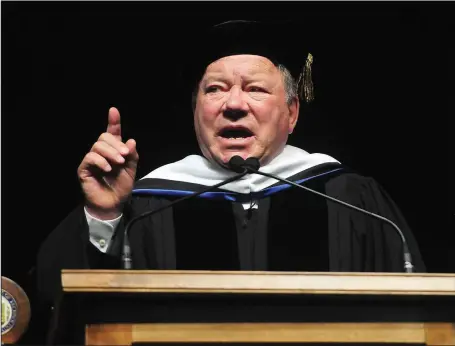  ?? Ernest A. Brown photos ?? Above, award-winning actor, director, producer, author and philanthro­pist William Shatner delivers this year’s commenceme­nt address to New England Institute of Technology graduates at the Dunkin’ Donuts Center in Providence Sunday. His message was one...