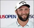  ?? AP photos ?? RIGHT PHOTO: Defending champion Jon Rahm answers questions during his media availabili­ty Tuesday.