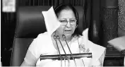  ?? PHOTO: PTI ?? Lok Sabha Speaker Sumitra Mahajan addresses the House on Monday even as papers torn by protesting members fly around her