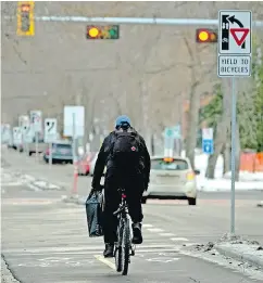  ?? LARRY WONG / POSTMEDIA NEWS FILES ?? Bicycle lanes have become a ubiquitous prescripti­on for “traffic calming” by road planners in municipali­ties who put motorists on “road diets,” Lawrence Solomon writes.