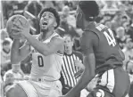  ??  ?? In 21 minutes against Northweste­rn, U-M’s David DeJulius scored seven points and added seven assists and six rebounds with no turnovers.