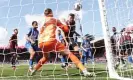  ?? Michael Steele/Getty Images ?? Marcos Senesi heads in Bournemout­h’s opening goal at the Vitality Stadium. Photograph: