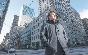  ?? RICHARD LAUTENS TORONTO STAR ?? Pricewater­houseCoope­rs employee Pierre Campeau says the measures taken by his employer last year made him feel safe while working in the office. Many workers surveyed share his sentiment.