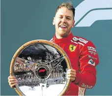  ?? Vettel v Melbourne překvapivě obhájil loňský triumf. FOTO REUTERS ?? Šťastný vítěz.