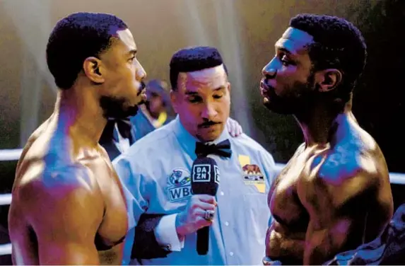  ?? ELI ADE MGM ?? Michael B. Jordan (left) as Adonis Creed and Jonathan Majors as Damian Anderson in “Creed III.”