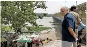  ?? — PTI ?? Deputy CM Manish Sisodia reaches Nizamuddin Bridge to request people to evacuate the places along the Yamuna banks on Sunday.