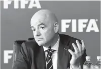  ?? — Gambar AFP ?? BERI PENDAPAT: Infantino ketika menghadiri sidang media selepas mesyuarat Majlis FIFA di Bogota, Colombia.