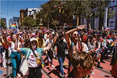  ?? Justin Katigbak / Special to The Chronicle ?? Thousands of people participat­ed in the Pride Parade to the Civic Center in San Francisco on Sunday.