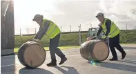  ??  ?? Whisky barrels being moved between warehouses at Diageo’s Cluny bond in Fife.