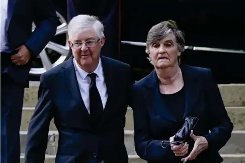  ?? (PA) ?? Wa l es’s first minister Mark Drakeford with his wife C l are