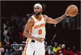  ?? John Bazemore/associated Press ?? Ex-spurs guard Patty Mills, who was waived by the Hawks on Feb. 29, signed with the Miami Heat to help their pursuit of a third Finals berth in the last five years.