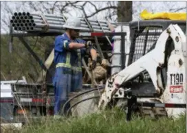  ?? DARRYL DYCK — THE CANADIAN PRESS VIA AP ?? A worker rolls up his sleeves as work continues at Kinder Morgan’s facility in preparatio­n for the expansion of the Trans Mountain Pipeline, in Burnaby, B.C., on Monday. The Houston, Texas, based company announced Sunday it has suspended all...