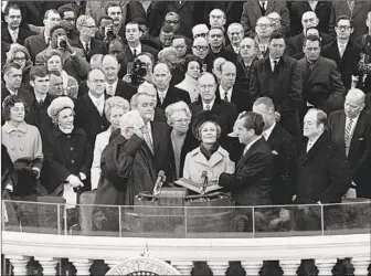  ?? Pictorial Parade ?? RICHARD NIXON is sworn in on Jan. 20, 1969, 50 years ago today. A former aide said those were “heady days, when Nixon was advocating things that were simply about good and better government.”