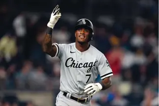  ?? JOHN MINCHILLO/ASSOCIATED PRESS ?? Chicago White Sox’ Tim Anderson reacts towards New York Yankees fans while running the bases after hitting a three-run home run Sunday. The visiting White Sox won both games.