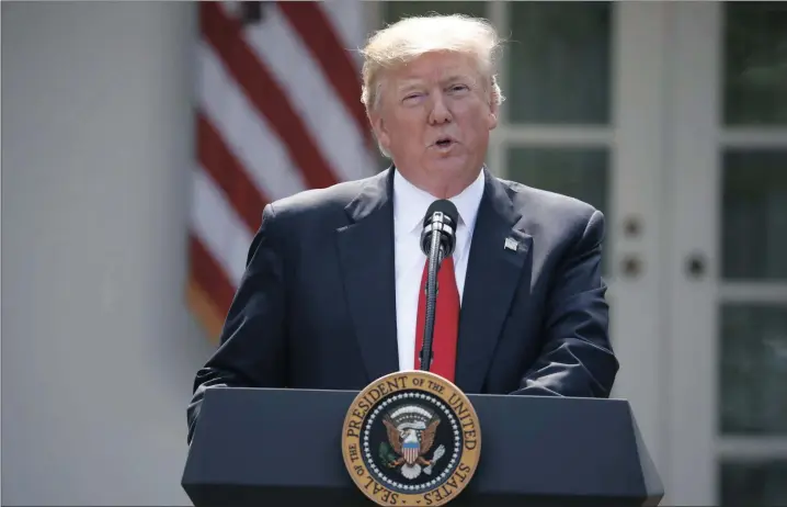  ?? PICTURE: AP ?? ABDICATING RESPONSIBI­LITY: President Donald Trump announced that the US was withdrawin­g from the Paris climate change accord, in the Rose Garden of the White House in Washington last Thursday.