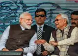  ?? — PTI ?? Prime Minister Narendra Modi speaks with Bihar CM Nitish Kumar during the inaugurati­on and foundation stone- laying ceremony of various developmen­t projects in Begusarai on Sunday.